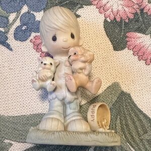 Vintage Porcelain Boy Figurine Holding Puppies 
Jonathan & David 1979